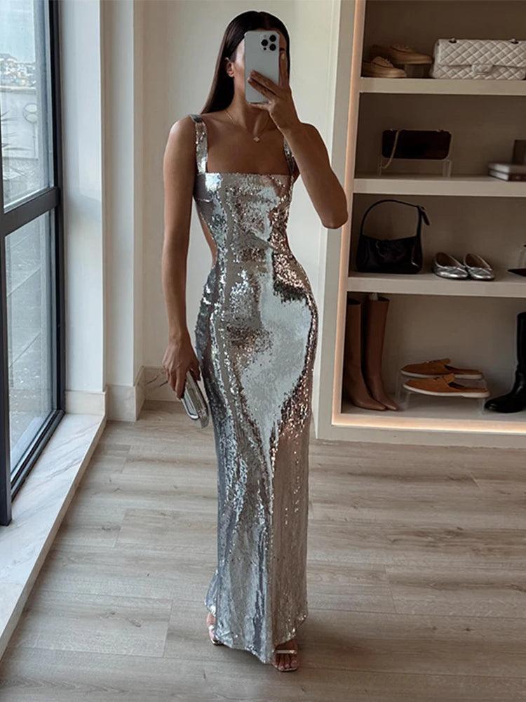 Sparkling Silver Maxi Dress: Elegant Backless Evening Gown Stylish Longline Maxi Dress Sparkling Silver Maxi Dress: Elegant Backless Evening Gown Stylish Longline Maxi Dress